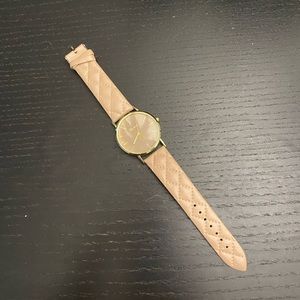 Gold and tan watches